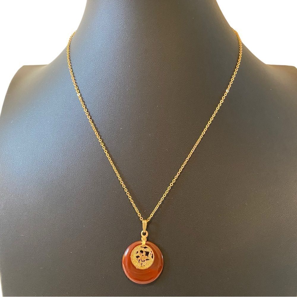 Delicate Looking Vintage Pendant on Shimmering Gold Tone Chain.